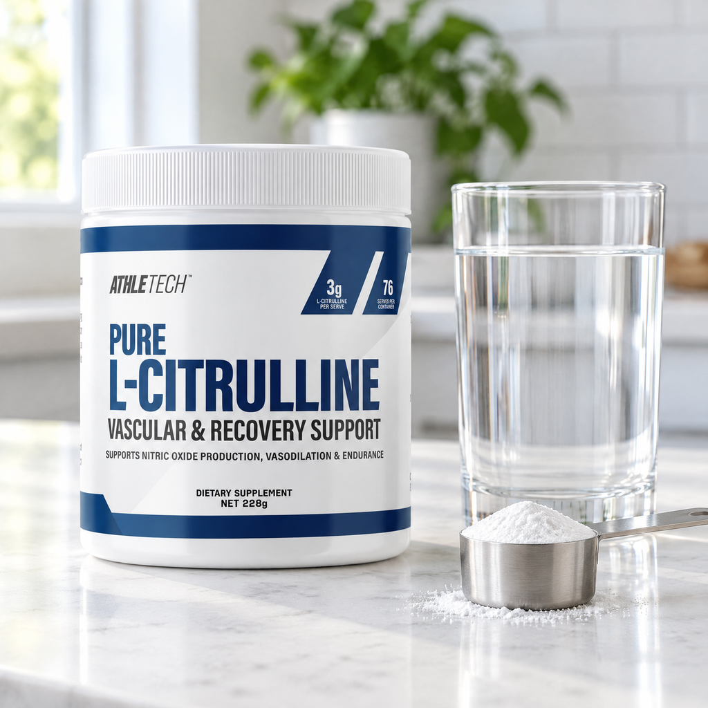 Athletech Pure L-Citrulline on a kitchen bench with a glass of water and a level scoop of powder